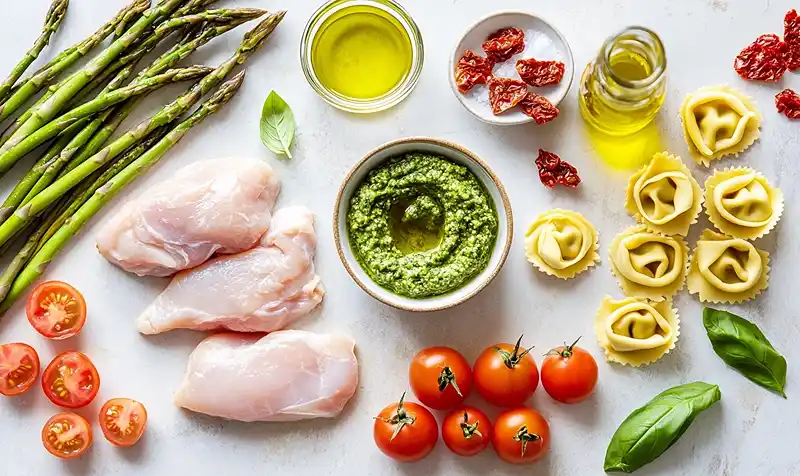 Ingredients For One-Pan Pesto Chicken, Tortellini, and Veggies
